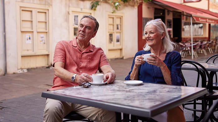 A couple having coffee in San Sebastian, La Gomera